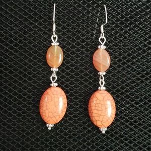 Coral-colored crackled acrylic and lampwork glass oval beaded earrings
